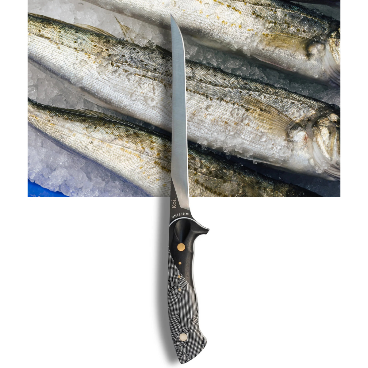 Fillet knife with black handle and silver blade on a background of fish fillets.